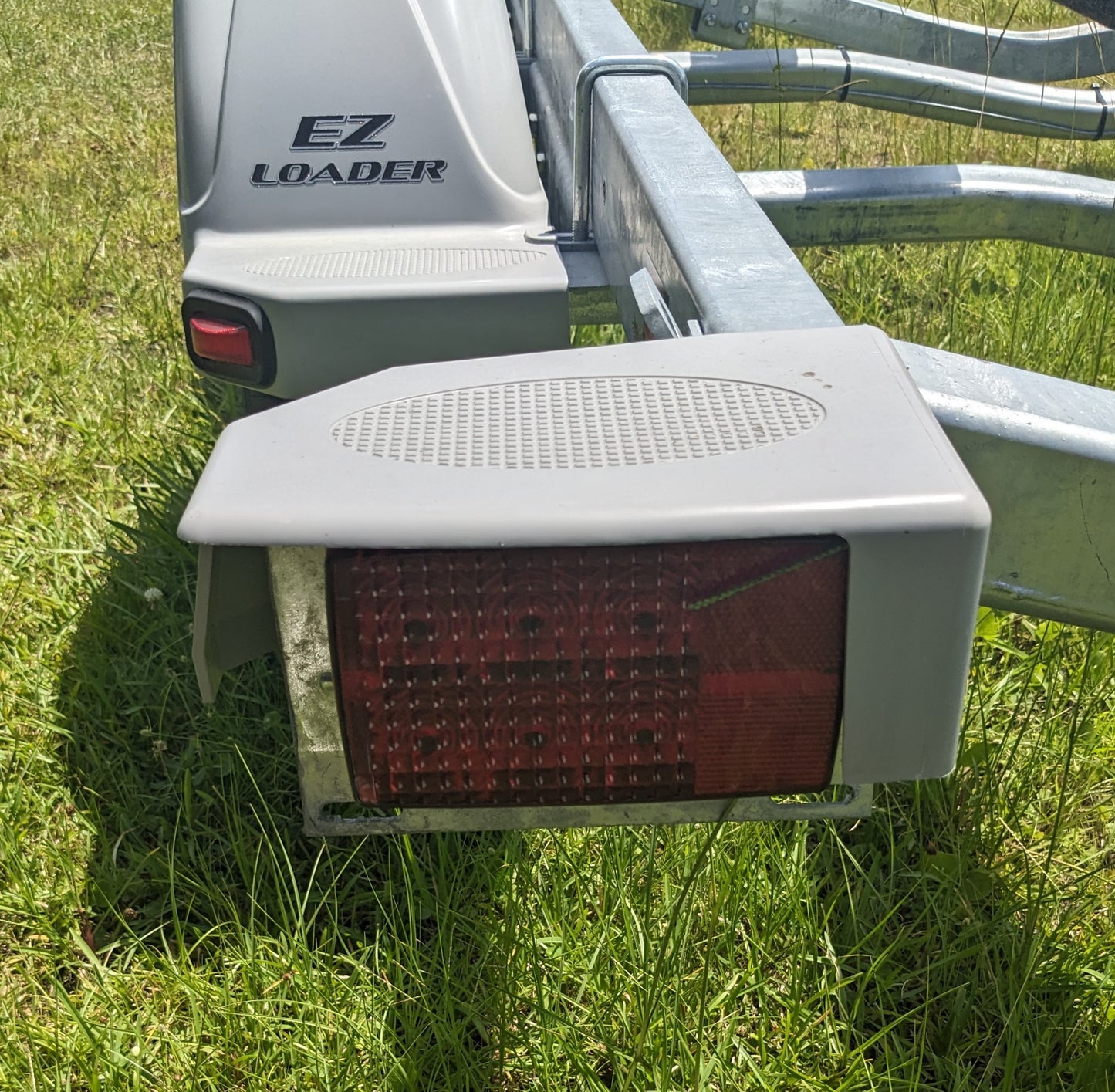 250-025173-10 Tail Light Cover Left Side On Trailer