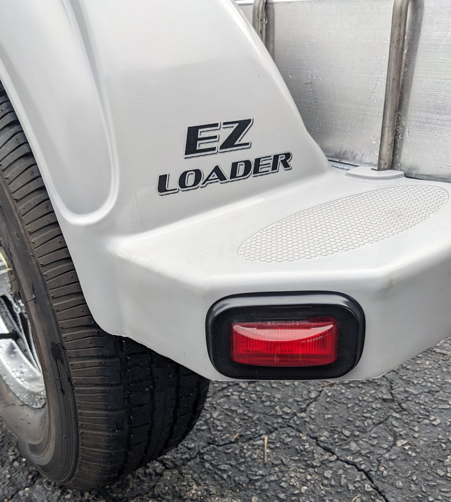 EZ Loader Boat Trailer Marker Light Grommet. Factory OEM Replacement 250-032127 on trailer