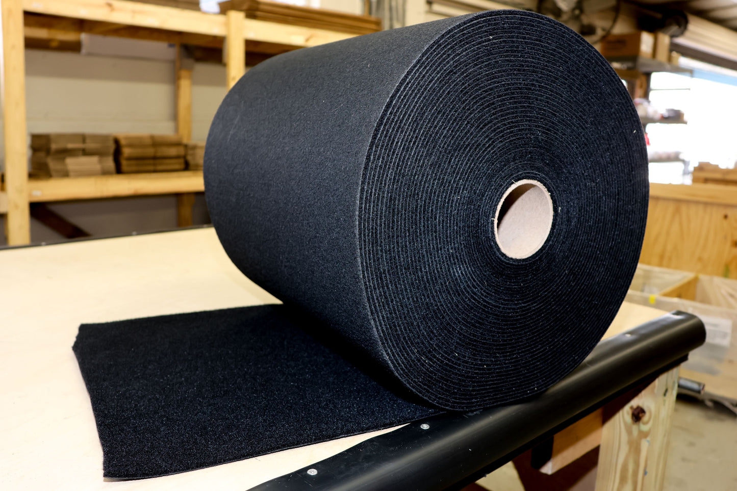 Detailed view of EZ Loader bunk carpet edge thickness and plush cushioning that protects aluminum and fiberglass hulls